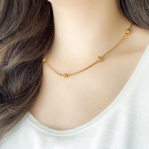 BRENTON vintage gold tone metal love knot necklace - 