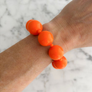 CLARENCE vintage 1970s chunky orange beaded stretch bracelet - 
