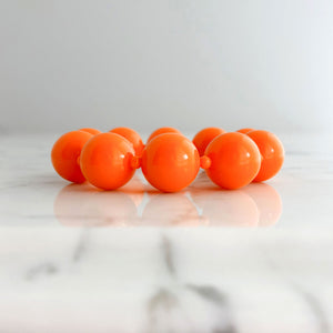CLARENCE vintage 1970s chunky orange beaded stretch bracelet - 