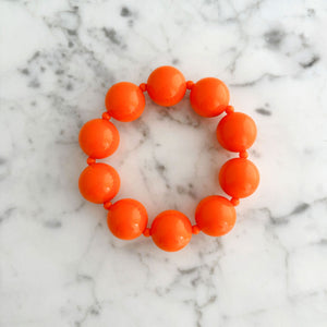 CLARENCE vintage 1970s chunky orange beaded stretch bracelet - 