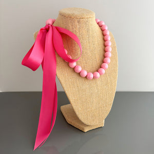 DELORES bright pink opalescent pearl ribbon tie necklace - 