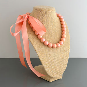 DELORES coral opalescent pearl ribbon tie necklace - 