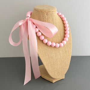 DELORES light pink opalescent pearl ribbon tie necklace - 