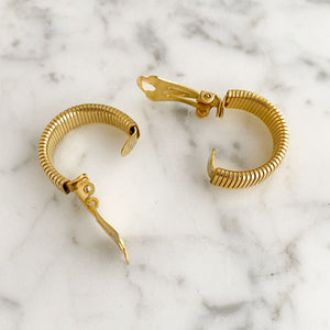 KRYSTAL gold tone omega hoop clip earrings - 