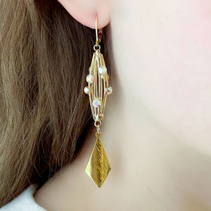 LIDIA long gold caged pendant earrings from Nantes, France - 