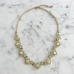 LEOPOLD vintage aurora borealis light gold filigree necklace