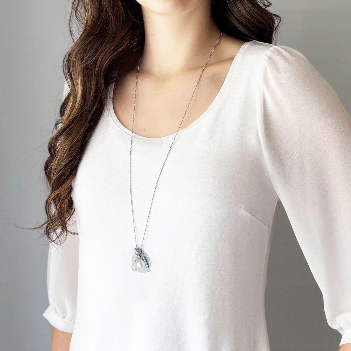 Art Deco numbered aluminum tag necklace with pearl, crystal and silver-tone charms