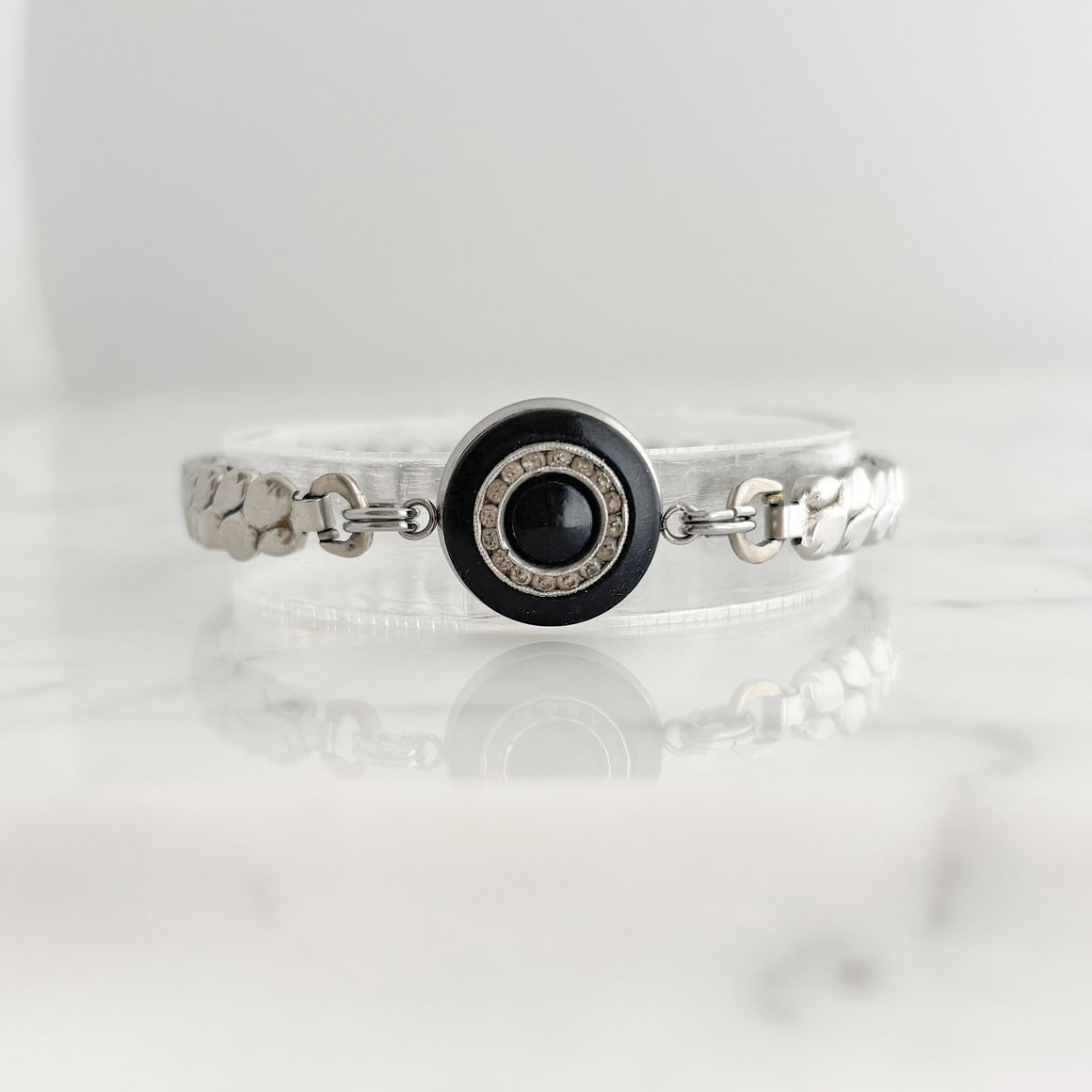 Vintage black rhinestone medallion bracelet worn on the wrist
