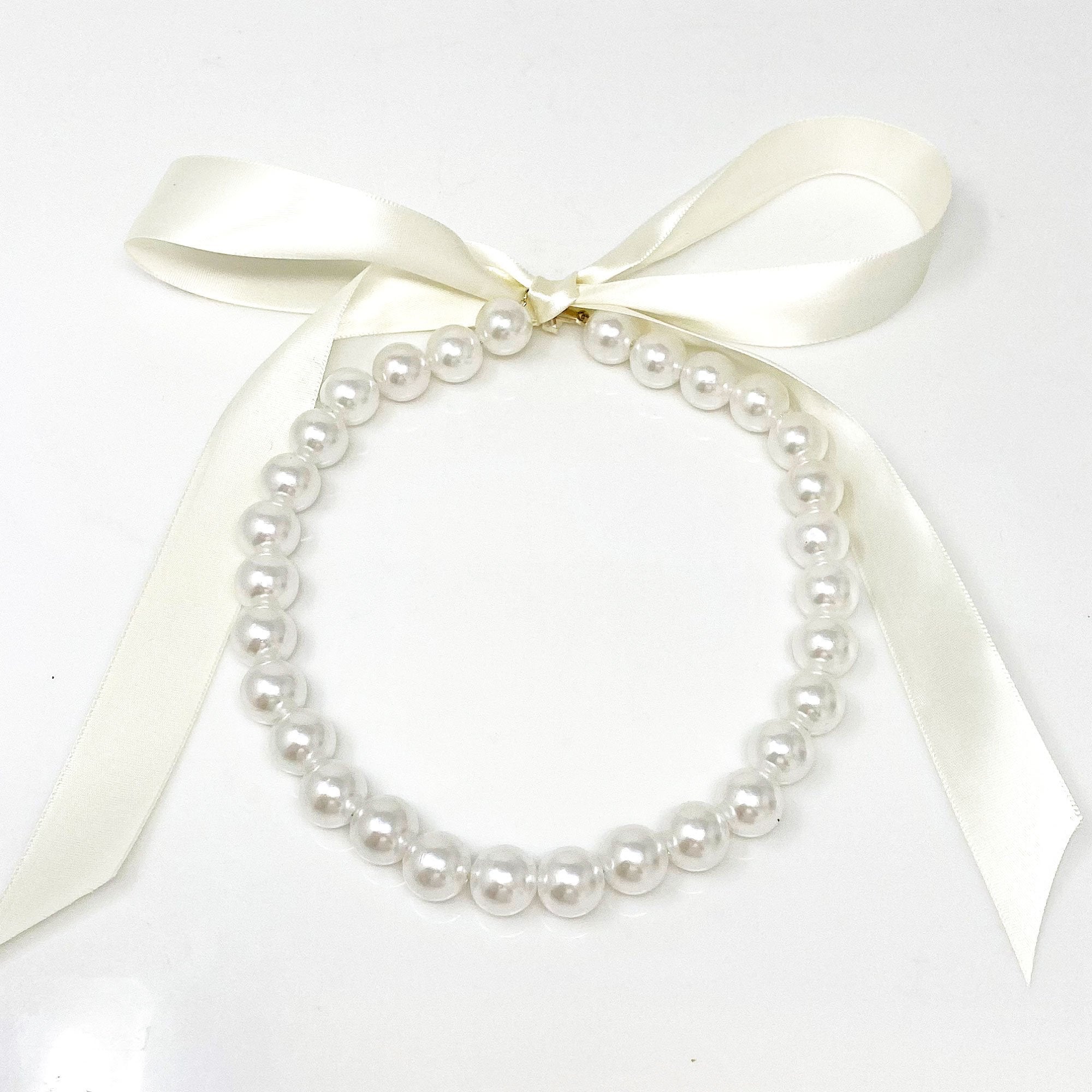 DOTTY light blue ribbon pearl necklace