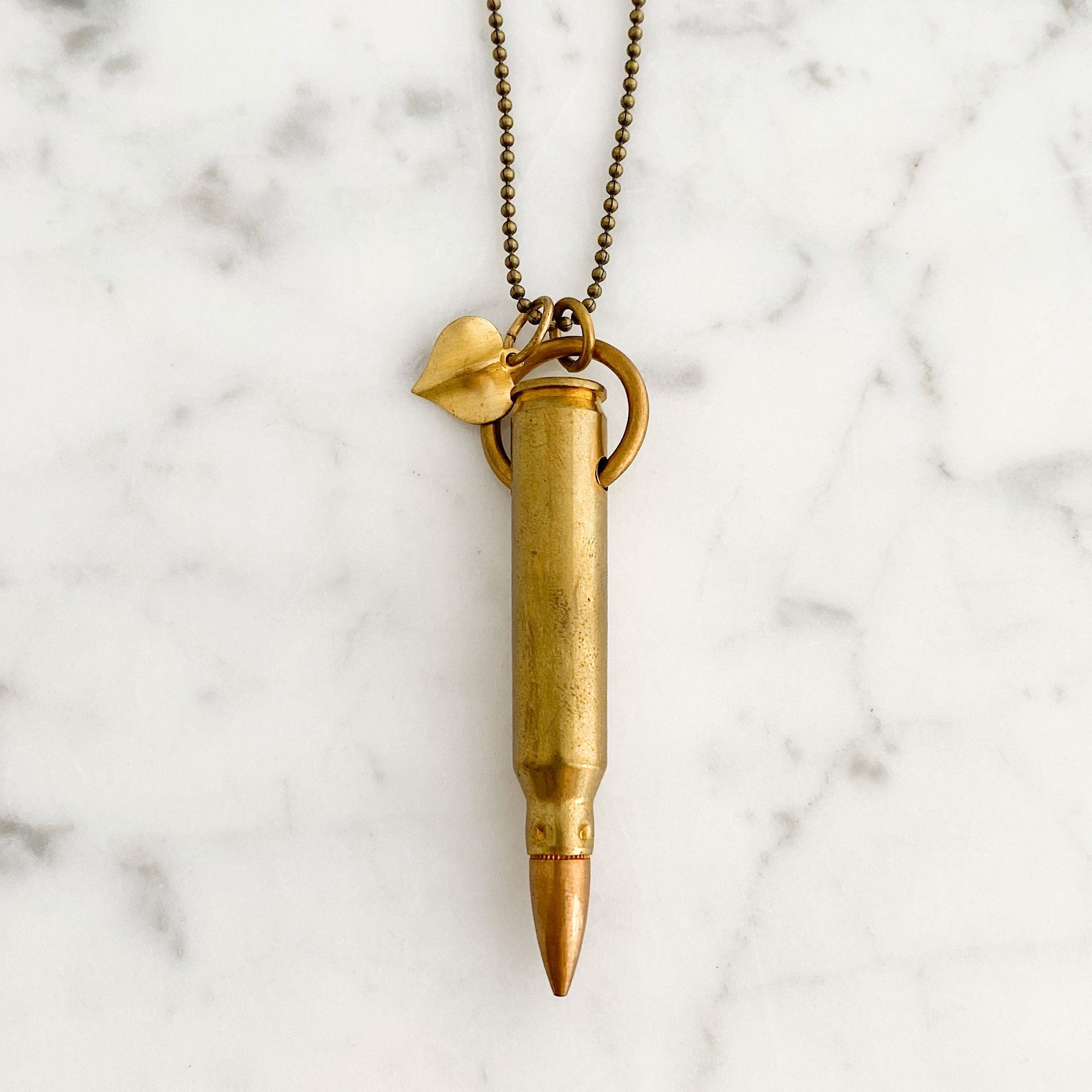 Vintage Bullet Casing Necklace | Industrial Brass Pendant Necklace | GUNSMOKE-GREEN BIJOU